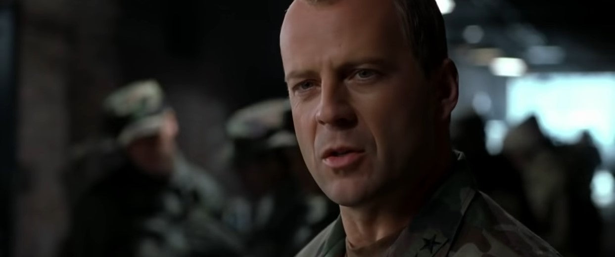 Bruce Willis, a famous Hollywood celebrity with a receding hairline.